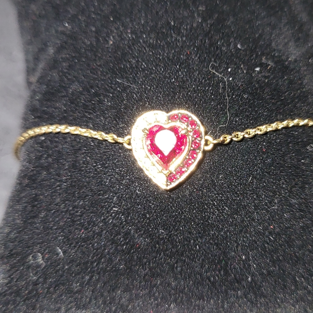 Gold tone sterling silver swarovski crystal red heart bracelet with slide clasp